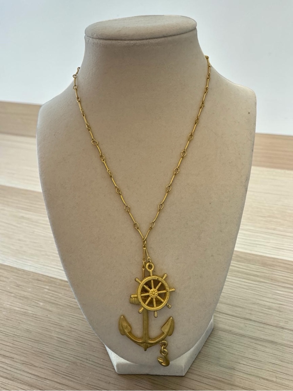 A vintage matte gold-tone nautical charm necklace